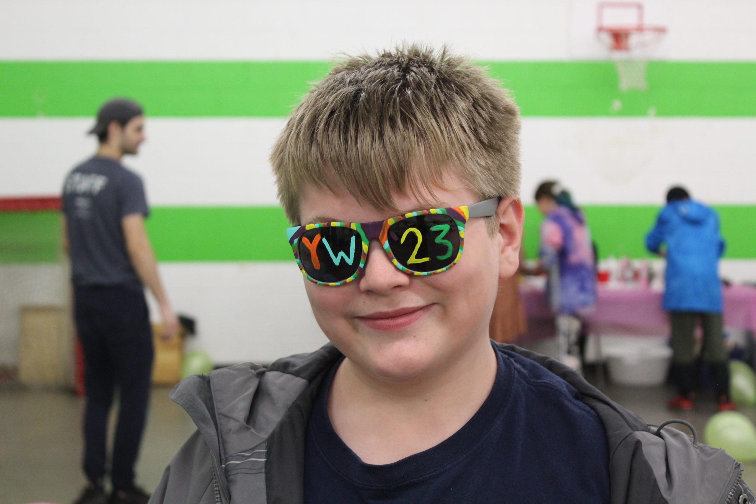 Youth with Youth Week glasses